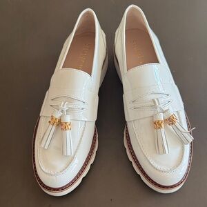 Stuart Weitzman Cream Loafers with Gold Tassels